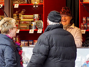 mature travelers at an outdoor market