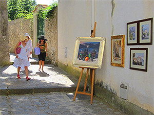paintings outside a store