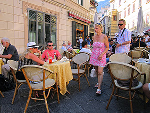 people at cafe tables