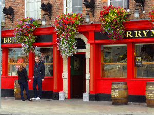 a red painted pub in Ireland