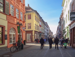 people walking along a street during a European trip