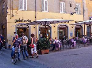 people at a cafein Lucca, Italy