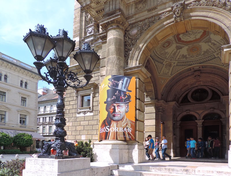 a large lamppost outside an old building