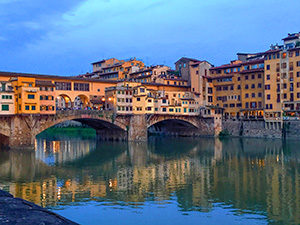 a bridge over a river in Florence