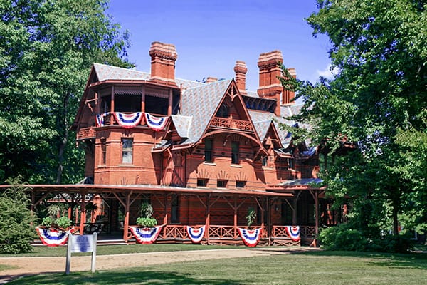 the Mark Twain House with bunting on the front- one of the homes of famous writers