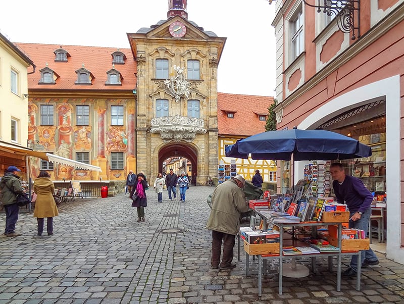 people by an old building in Bavaria, seen on a day trips from Munich