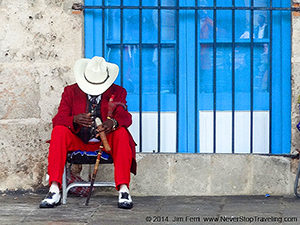 man in a red suit in the Caribbean