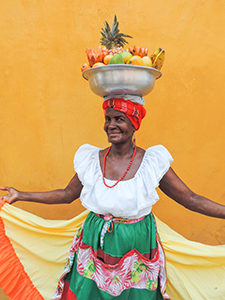 a woman fruit vendor in Cartagena