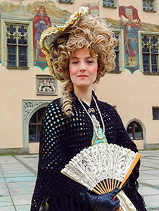 a woman in period costume in Bavaria, seen on a day trip from Munich