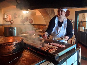woman cooking at a grill in Bavaria