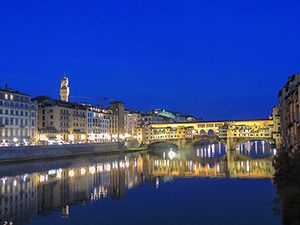 a bridge at night in Italy