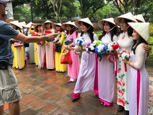 young women in colorful dresses in Hanoi