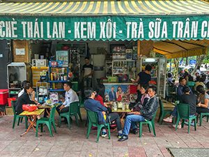 people sitting in a cafe in Hanoi
