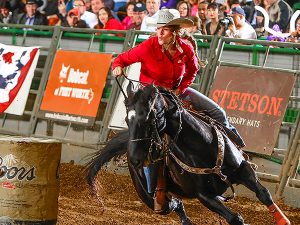 woman racing a horse in Texas
