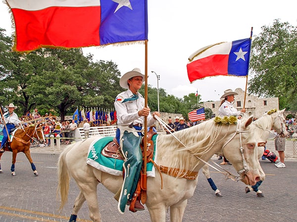 horsemen in a parade on the Chisholm Trail in Texas