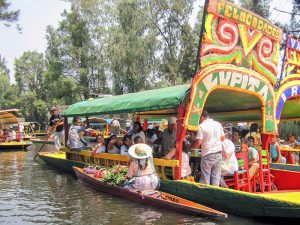 brightly colored boats seen on a day trip from Mexico City