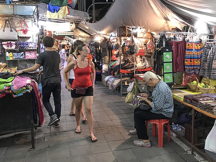 women walking throgh a bazaar, , one of the things to do in Chiang Mai