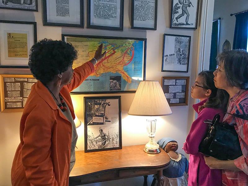 woman pointing at a map - things to do in Memphis