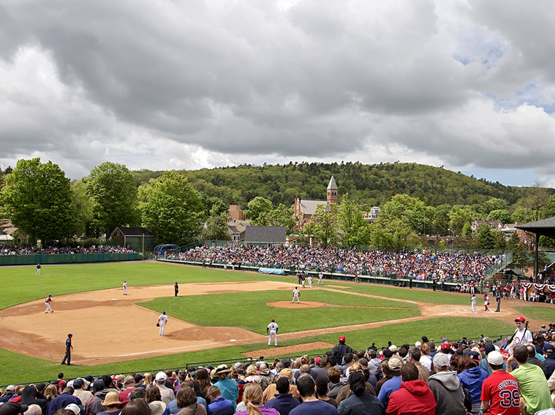 people at a baseball game in Cooperstown ny