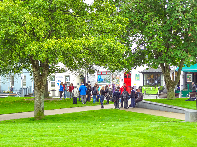 people visiting a small park - one of the things to do in Galway