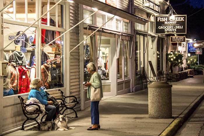 Two women talking in front of a store in Door County, Wisconsin