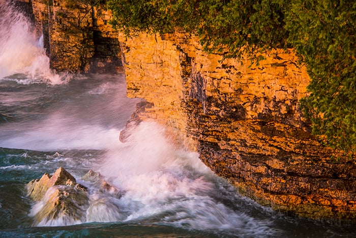 waves crashing on rocks in Door County, Wisconsin