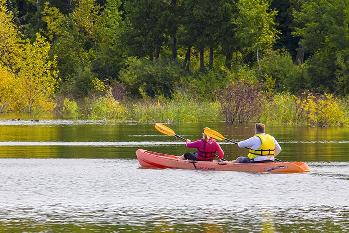 kayakers on a lake