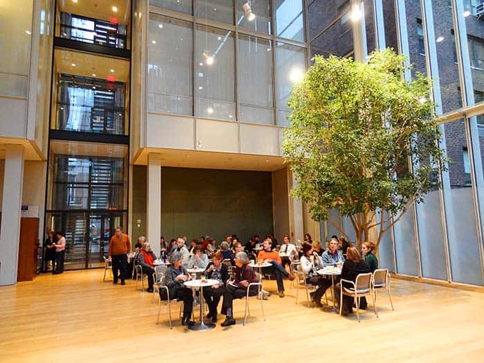 people at cafe tables in the Morgan cafe, one of the best restaurants in New York City museums