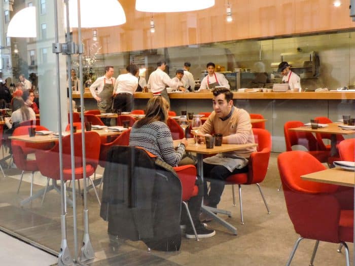 A couple at a table in one of the best restaurants in New York City museums