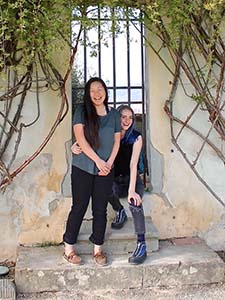 two sudents in a doorway in a study abroad program