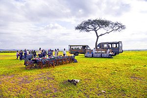 people having breakfast on safari in kenya