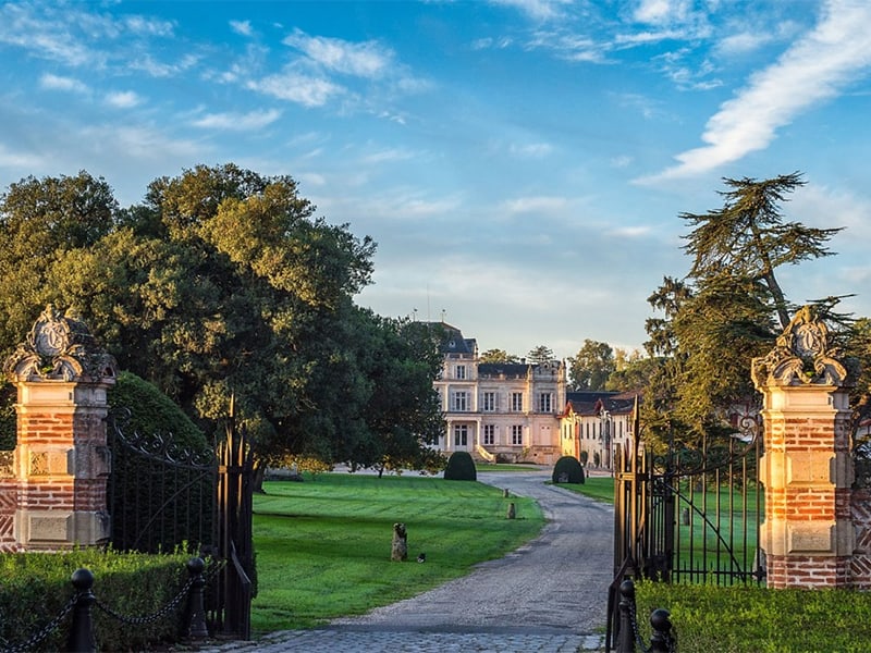 a chateau seen on a bordeaux river cruise