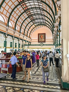 people in a large post office - best city in Vietnam