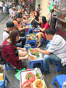 people eating street food 