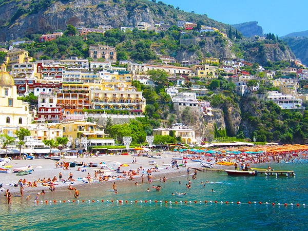 people at a beach top 10 in Italy
