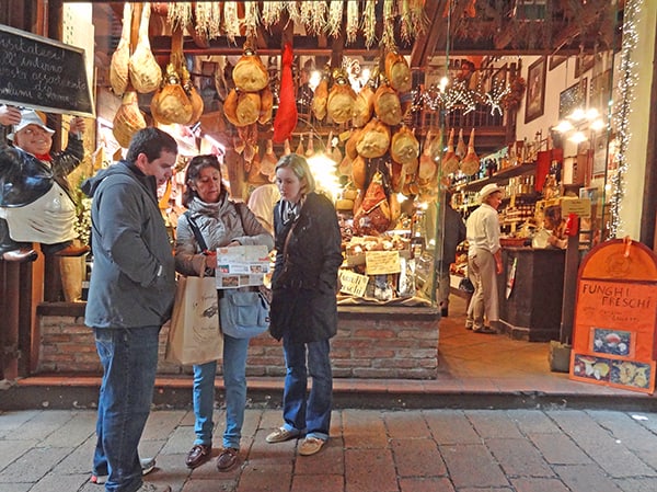 people outside a food store top 10 in Italy