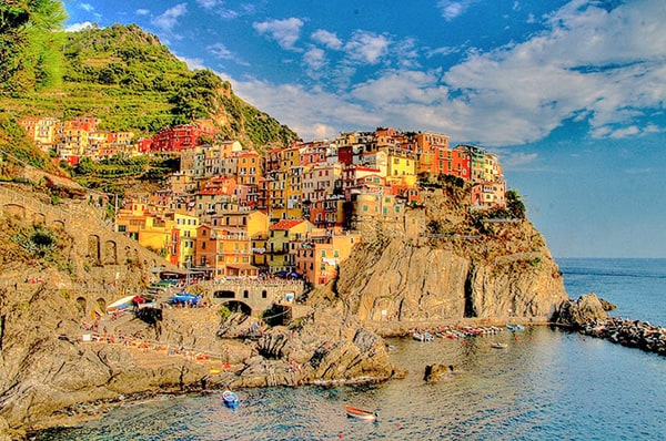 an old village on the sea at sunset top 10 in Italy