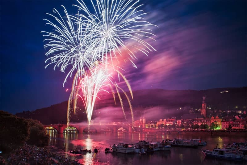 fireworks over a river in Heidelberg