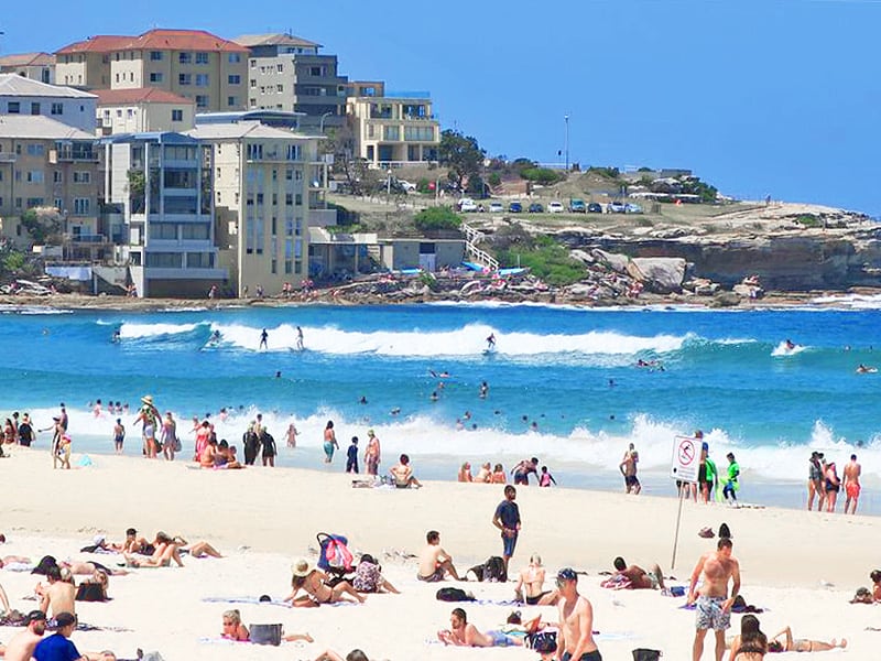 surfers  on Bondi Beach - seen on a trip to Sydney and the Hunter Valley