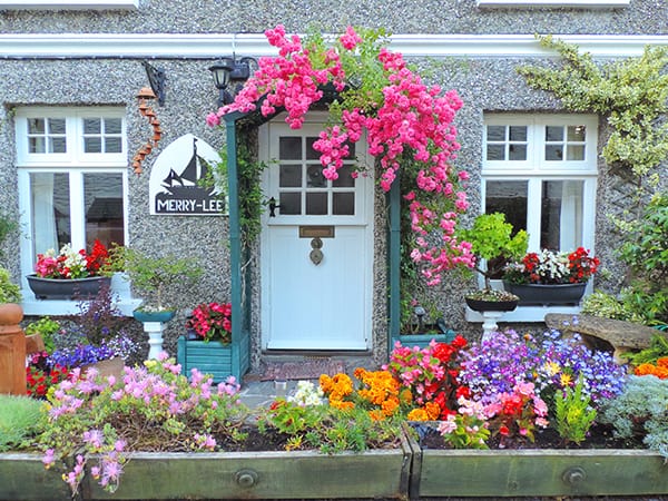 a house with beautiful flowers