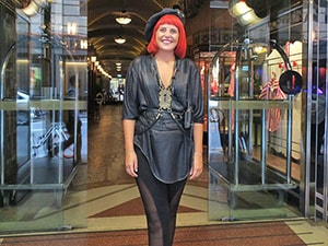 Hotel Greeter with bright red hair