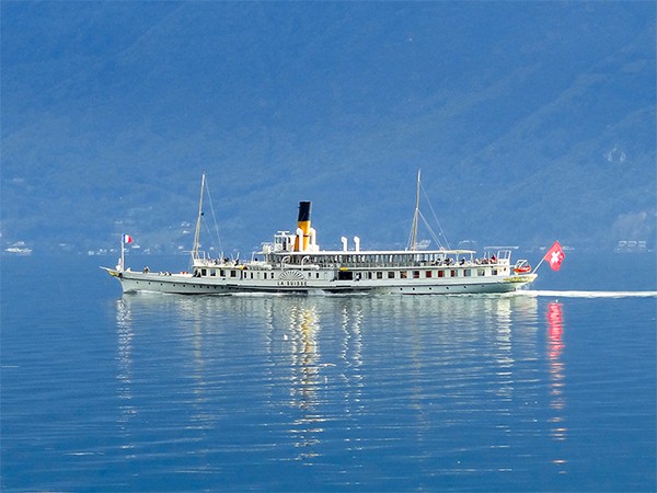 an old steamer on a lake
