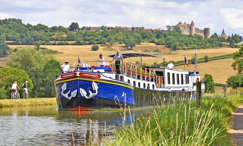 people on a canal holiday in europe