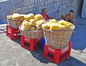 men selling sponges