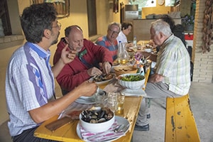 people eating sefood in in Friuli Venezia Giulia