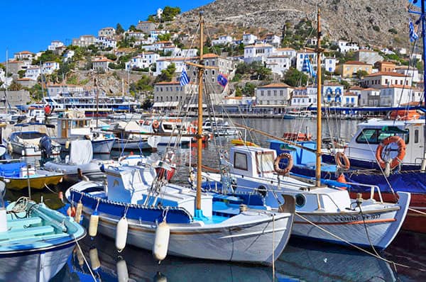 boats in a harbor on an island closest to Athens