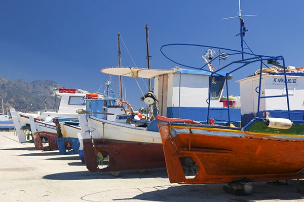 fishing boats on a beach