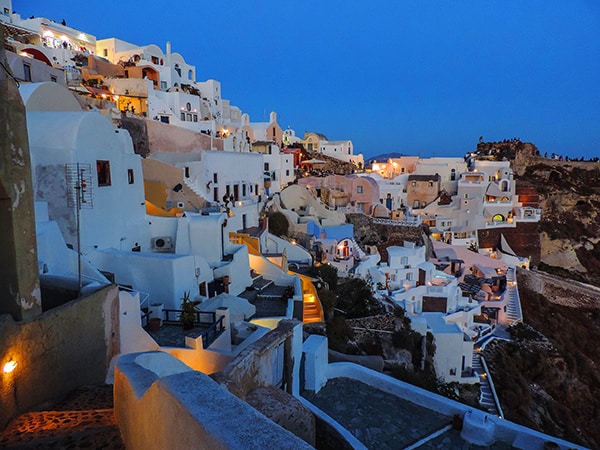 people on a Greece holiday on Santorini, one of the best Greek islands to visit