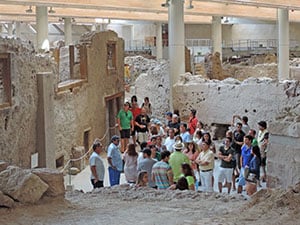 people on a Greece holiday in an archeological site