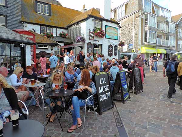 people at a pub in Cornwall